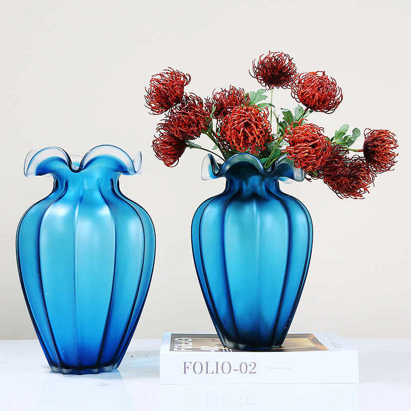 Vase blue made of colored glass, modern minimalist style, perfect for home decor.
