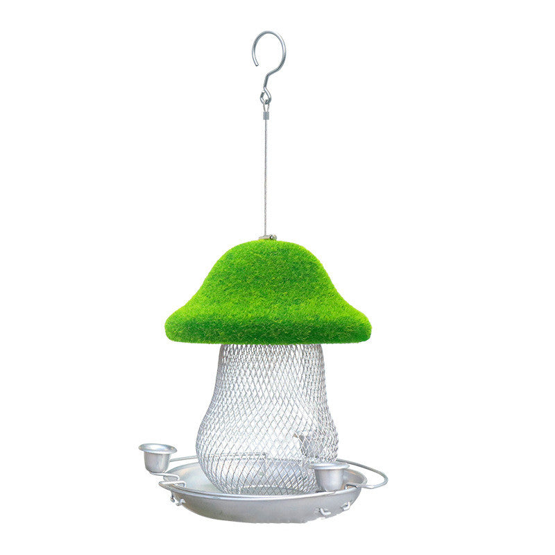A green, hanging resin bird feeder shaped like a mushroom with a small opening for birds to access seeds. Suitable for outdoor use in courtyards and gardens.