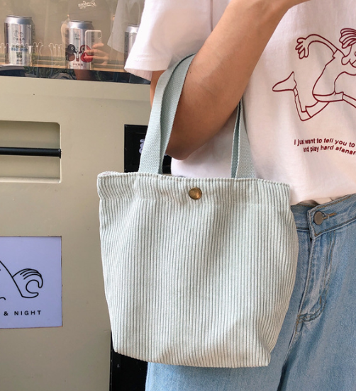 A collection of mini tote bags in various colors, inspired by Korean style. These eco-friendly and reusable bags are perfect for everyday use, carrying small essentials, or gifting to friends and family. 